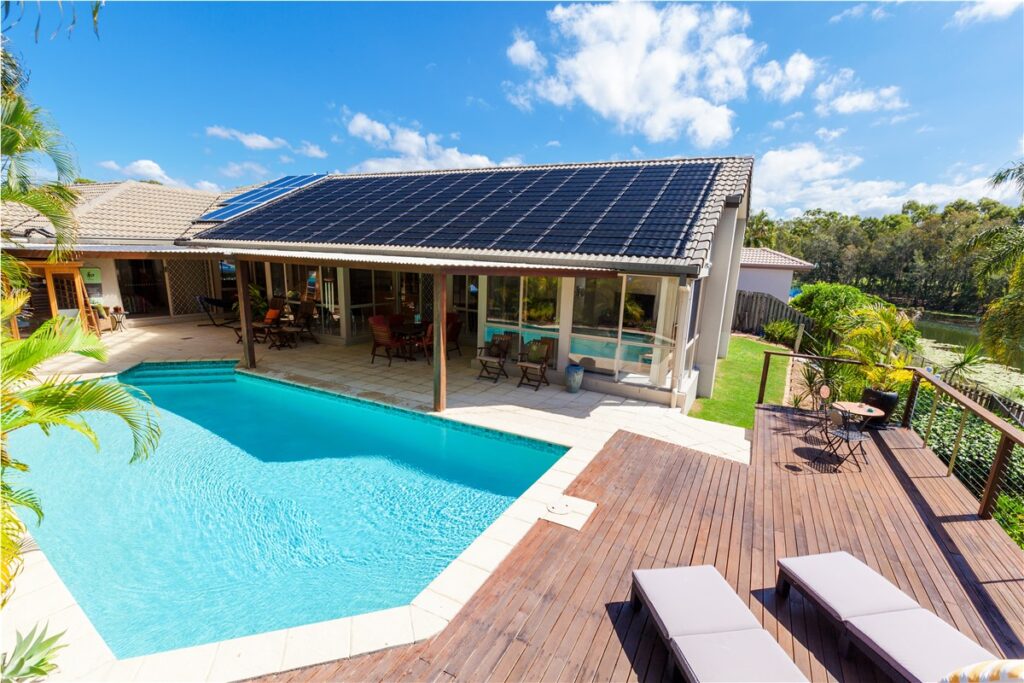Luxury Southern California home with rooftop solar panel installation and energy-efficient roofing system