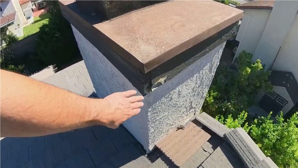 wood-rot-on-chimney-roof-damage