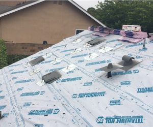 Residential roof prepared with underlayment and materials during professional roof repair services in Southern California