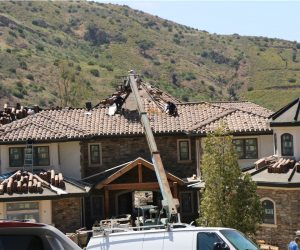 Tile roofing materials being installed on a Southern California home by August Roofing & Solar
