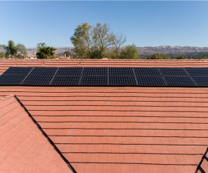 Low-profile solar installation integrated into a tile roof on a Southern California home